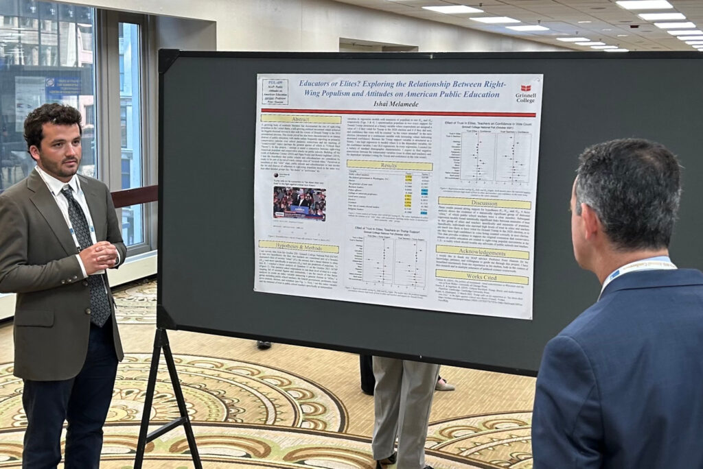 Ishai Melamede presents his poster, "Educators or Elites? Exploring the Relationship Between Right-Wing Populism and Attitudes on American Public Education," at the Midwest Political Science Association conference.